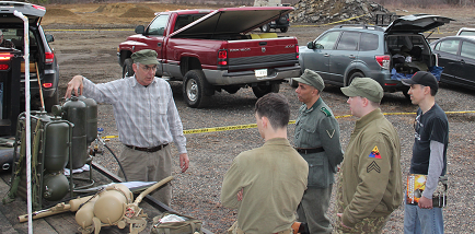 Author, left, training a group of potential operators at MA WWII Weekend in 2015.